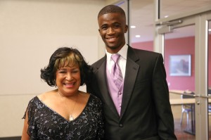 Winner for the HBCU Award for Best Male Athlete, JSU Anaso Jododwana (right) poses with JSU president Carolyn Meyers.