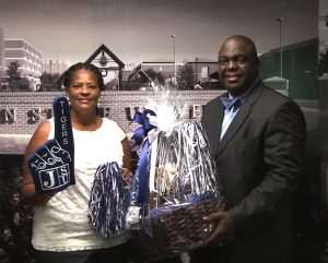 Text-2-Win winner, Morlyn Russell, and Eric Stringfellow, University Communications executive director.