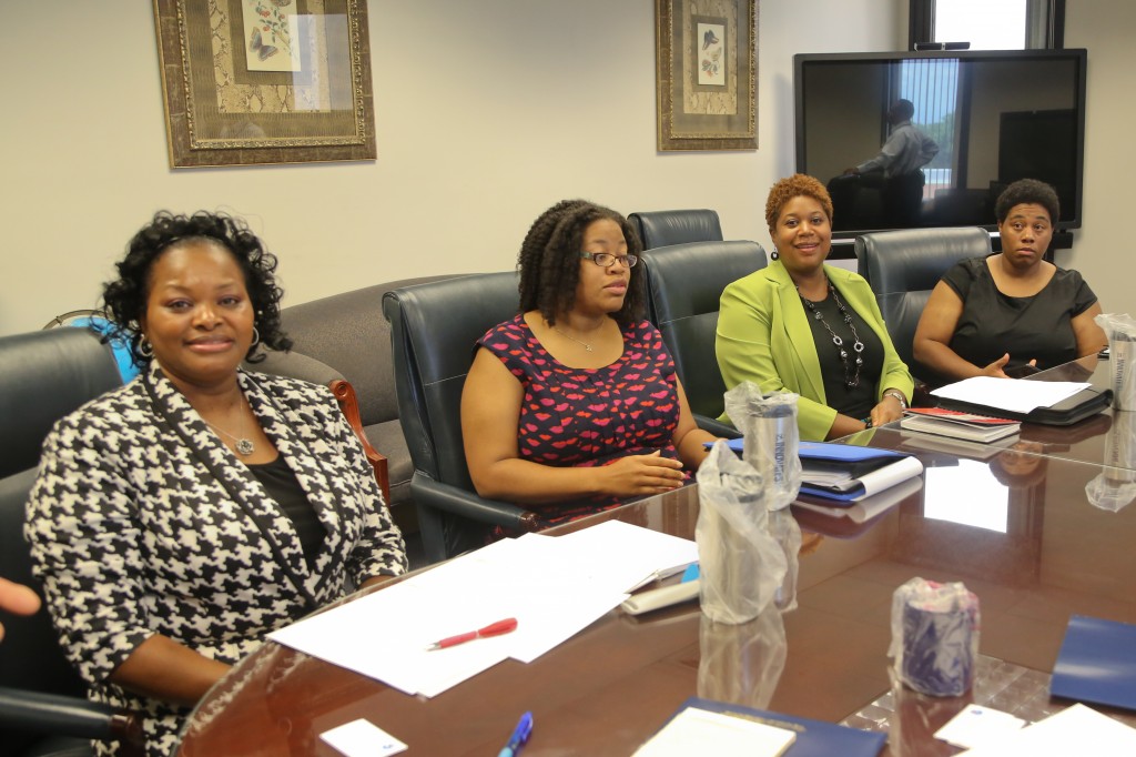 NOAA staffers Cindy Polk Woods, left, Aisha Reed Haynes, Dr. Jamese Sims and Latrice Maxie credit Jackson State University for their successes.
