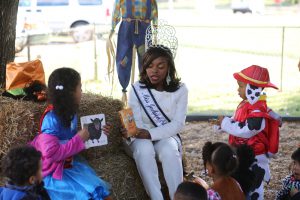 Anissa C. Butler, Miss Jackson State University 2014-2015, reads to 3- and 4-year-old students during the Lottie W. Thornton Early Childhood Center’s Fall Carnival, Friday, Oct. 31. (Photos: Anissa Hidouk, JSU)