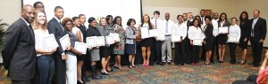 The inaugural charter class of Phi Theta Kappa Alumni Association receiving their pins, Oct. 28, 2014. (Photo by Charles A. Smith, JSU)