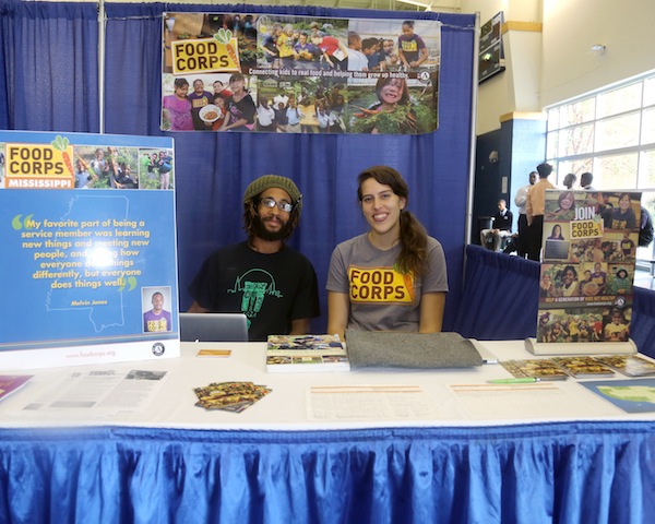 Liz Broussard, state fellow for FoodCorps Mississippi, and Charles Greenlea, 29, a service member from Atlanta, Ga., were among more than 50 recruiters talking with students at Jackson State University’s Career Fair held at the Walter Payton Recreation Complex on Thursday, Oct. 2, 2014. (Photo by Charles A. Smith, JSU)