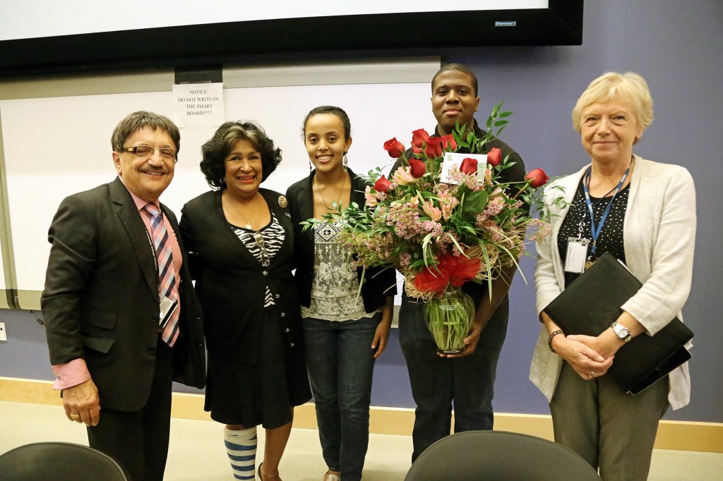 Jackson State University President Dr. Carolyn W. Meyers (second from left) is presented roses by members of the Society of Women Engineers on Monday, Oct. 20, 2014. From left: Richard A. Alo`, dean, College of Science, Engineering & Technology; Meyers; Meron Asnake, a junior in civil engineering; Jonathan Malone, sophomore in civil engineering; Dr. Danuta Leszczynska, professor of environmental engineering, Department of Civil and Environmental Engineering, and coordinator of the Society of Women Engineers. (Photos by Charles A. Smith, JSU)