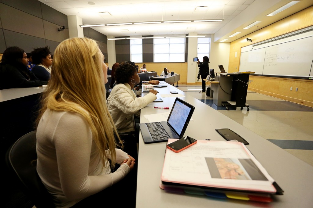 Dr. Gloria Miller (right) uses Apple iPad technology in her Biology 101 class Monday, Nov. 3, 2014. (Photo by Charles A. Smith, JSU)