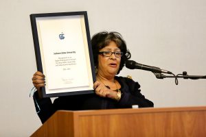 Jackson State University President Dr. Carolyn W. Meyers holds up the Apple Distinguished School award granted the university on Monday Nov. 3, 2014. (Photos by Charles A. Smith, JSU)