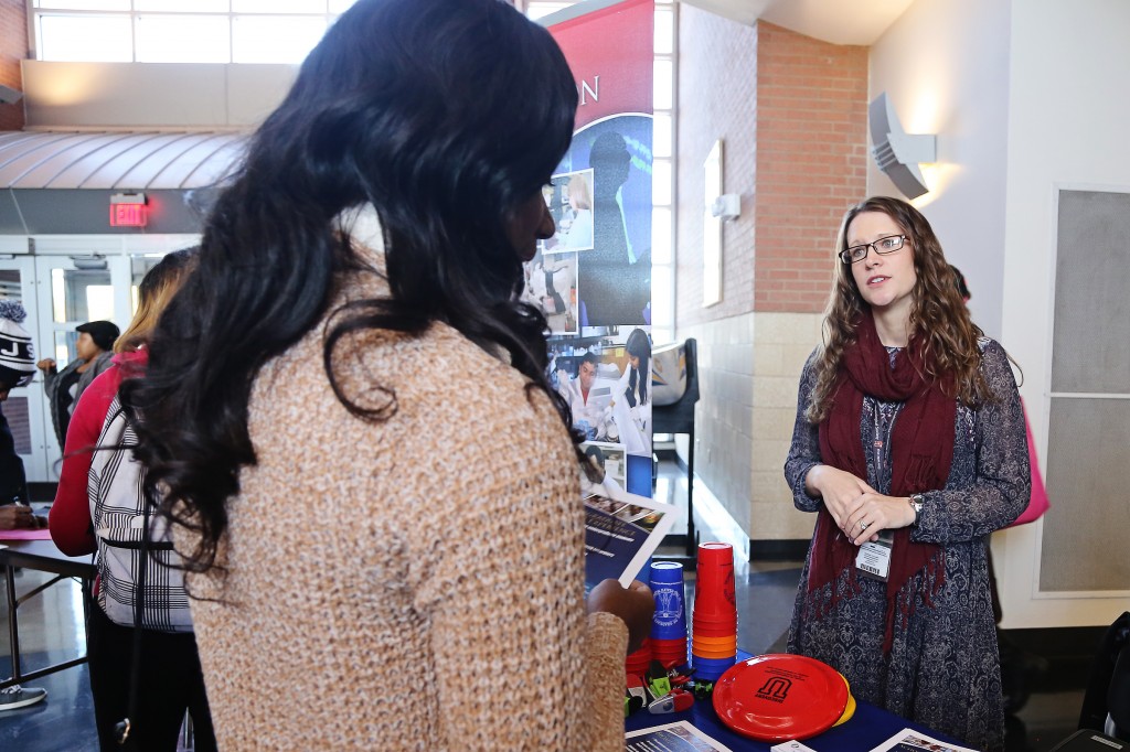 JSU student Jewel Newton, a freshman biology major from Brookhaven, talks with Sydney Murphy, academic dean of the University of Mississippi Medical Center. (Photo by Charles A. Smith, JSU)