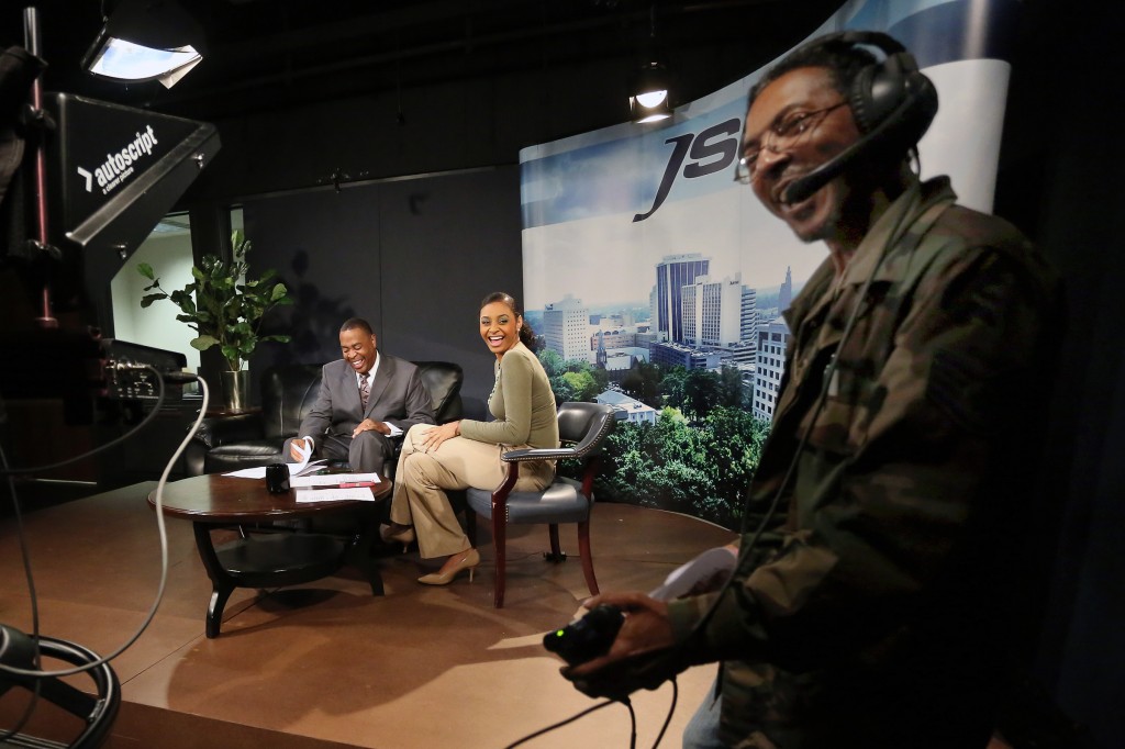 'Metro Morning Live' Hosts Rob Jay and Maura Moed share a laugh with Mel Claverie, camera operator and floor director on the JSUTV show. (Photos by Charles A. Smith, JSU)