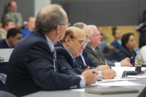 Judges, including Ron Ogan, a member of the board of governors of the Institute of Electrical and Electronic Engineers Inc., view Senior Engineering School projects, Dec. 4, 2014. (Photo by Charles A. Smith, JSU)
