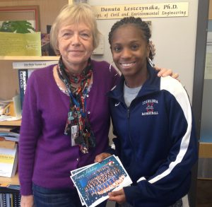 Women's basketball student-athlete Ayanna Lynn delivers a holiday card to Professor Danuta Leszczynska of the JSU Department of Civil and Environmental Engineering to say "thank you" for her help in teaching athletes. (Photo: Keith Fennell, Coordinator, Student Athlete Support Services Athletic Academic Enhancement Center)