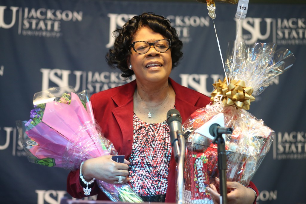 Dr. Elayne Hayes-Anthony presented with flowers at the Mississippi e-Center@JSu after being named director of the Jackson State University Department of Mass Communications on Jan. 30, 2015. (Photo: Deontae Williams, JSU)