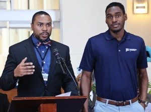 Charles Judkins (left), director, JSU Recreation Complex, recognizes Raymond Gee, a junior in criminal justice, for his help in working over the holiday break. (Photo by Charles A. Smith, JSU)