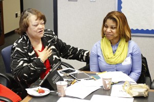 Dr. Mary M. White (left), interim vice president of Institutional Advancement and chair of the Department of Entrepreneurship and Professional Development, speaks at the Jackson Business Developers Roundtable at the College of Business on Friday, Feb. 6, 2015, as Bria R.Griffith looks on. (Photo by Deontae Williams, JSU)