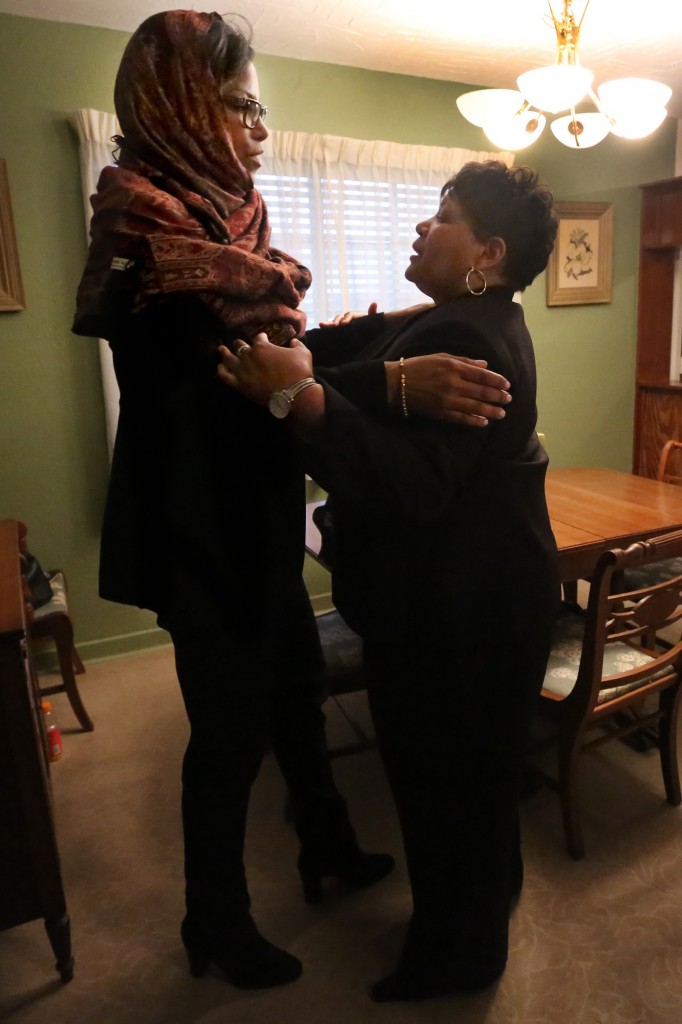 Reena Evers-Everette (right), welcomes Ilyasah Shabazz, daughter of assassinated civil rights leader Malcolm X, for the first time to the Evers home in Jackson, Miss., where her father, Mississippi civil rights leader Medgar Evers, was killed. The two spoke publicly for the first time about their fathers’ deaths at a meeting at Jackson State University later in the evening, Feb. 16, 2015, honoring the 50th anniversary of Malcolm X’s death. (Photo by Anissa Hidouk, JSU)