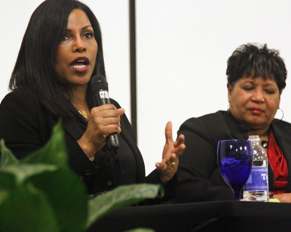 Ilyasah Shabazz (left), daughter of assassinated civil rights leader Malcolm X, and Reena Evers-Everette, daughter of assassinated Mississippi civil rights leader Medgar Evers, talk together for the first time publicly about the impact of their fathers’ deaths at Jackson State University, Feb. 16, 2015. (Photo by Deontae Williams, JSU)