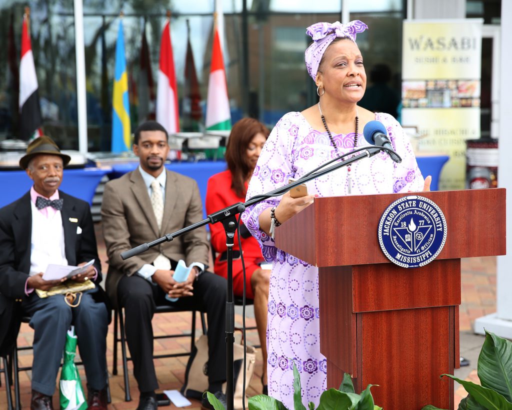 Shirley Harrison interim director of the JSU International Programs Office, officially being renamed this week JSU Global, urges students, faculty and staff to enjoy International Week during ceremonies Monday, March 23, 2015. (Photo: Deontae Williams, JSU)