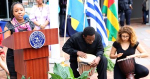 Kayla Wilson, a music education major, sang a benediction in Swahili before the food was served on the plaza in front of the Student Center during opening ceremonies for International Week, March 23, 2015. (Photo by Deontae Williams, JSU)