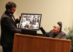 Dr. Doris Derby presents a collage of photos that show events in Jackson during the civil rights struggle to Dr. Robert Luckett, director of JSU’s Margaret Walker Center for the Study of the African-American Experience, Thursday, April 23, 2015. (Photo by Charles A. Smith, JSU)
