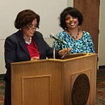 Hinds County Board of Supervisors President Peggy Hobson Calhoun (left) award a resolution to Angela Stewart, archivist for JSU’s Margaret Walker Center for the Study of the African-American Experience at the Board's meeting on the JSU campus April 20, 2015.