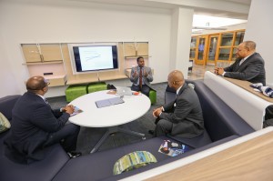 Dr. Robert Blaine, dean of Undergraduate Studies and CyberLearning, explains JSU’s state-of-the-art cyberlearning environment to Lockheed Martin Corporation officials, from right to left: Gerald G. Harvey, Jr., vice president of legislative affairs with the corporation’s Washington, D.C., operations; Derek W. McGowan, program manager, science, technology, engineering and mathematics (STEM) and higher education programs; and Vernon Ross, director of STEM and higher ed programs. (Photo by Charles A. Smith, JSU)