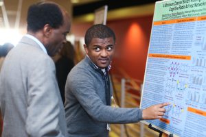 Student presenter Mesafint Fanuel explains his research to Dr. David Akombo of the Music Department during the Undergraduate Research Conference Thursday at the Student Center. (Photo: Anissa Hidouk, JSU)