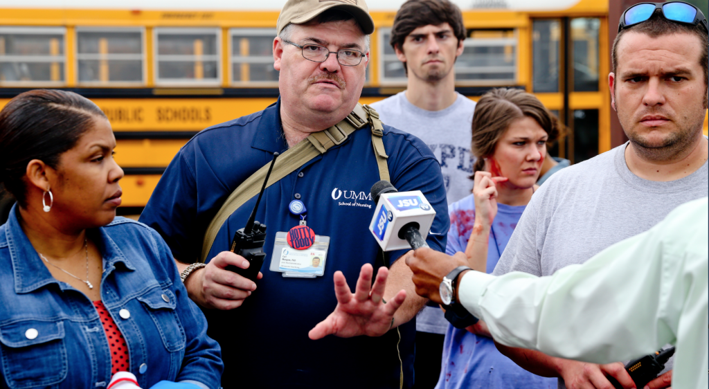 After the mock training, professionals are debriefed on topics ranging from proper roles to precise communication. Experts were reminded to always identify themselves, their locations, the situation and the resources needed, such as more ambulances or fire trucks. Speaking plainly is critical, as well as understanding cardinal directions – north, south, east and west. (Photo by Deontae Williams/JSU)