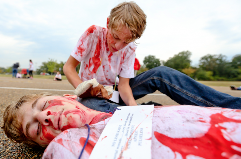 A “victim” lay lifeless on the pavement in the parking lot of the Lee E. Williams Athletic and Assembly Center on the main campus of Jackson State University. (Photo by Deontae Williams/JSU)