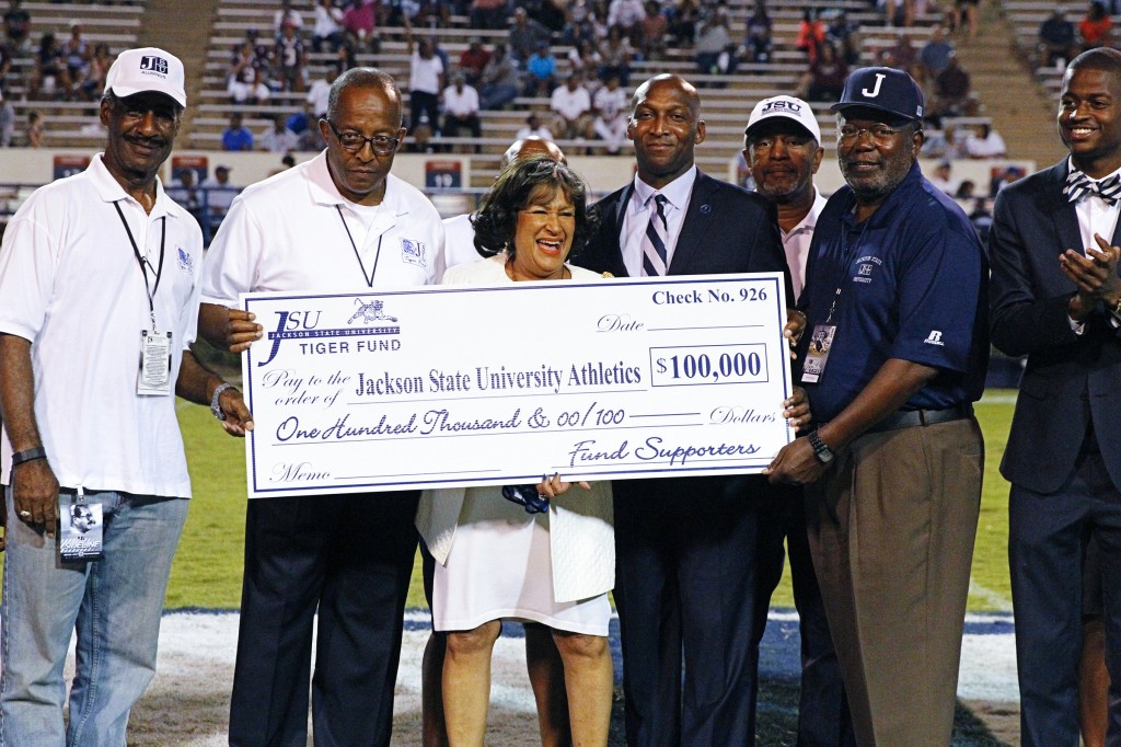 JSU President Carolyn W. Meyers accepts a contribution from the Tiger Fund. (Photo by Charles A. Smith/JSU)