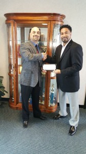College of Business Dean Ramin Mayasmi and JSU alumnus Lovell Cox.