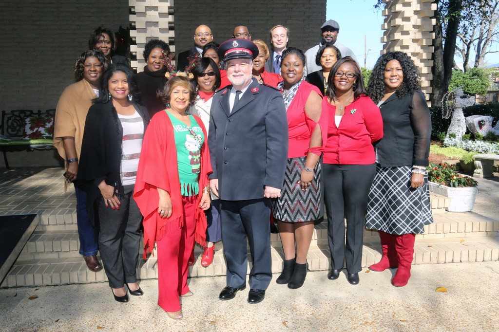 Meyers and Chapman join staffers in a celebration of the Christmas season. (Photo by Charles A. Smith/JSU)