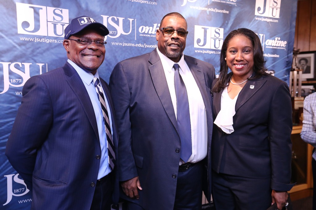 Hughes, left, comes to JSU from Mississippi State University, where he spent seven seasons on the Bulldogs football coaching staff. He’s pictured with Athletic Director Wheeler Brown and Yolanda Owens, president of the JSU National Alumni Association. (Photo by Charles A. Smith/JSU)