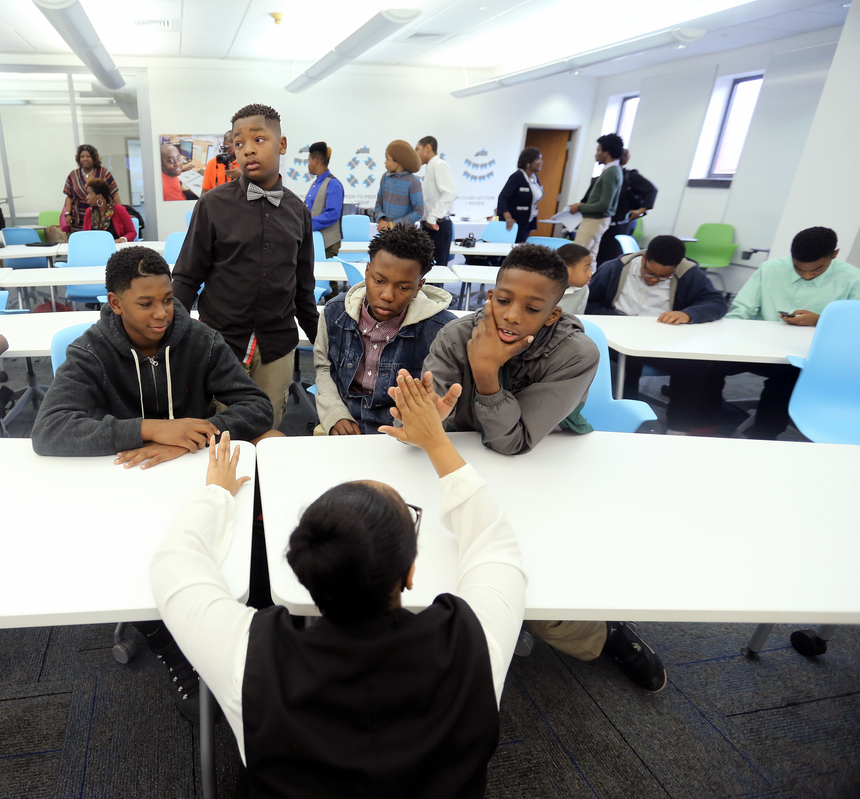 Thorpe bonds with Blackburn Laboratory Middle School students: Kendarrius Smith, left, Caleb Thomas, Daveron Rese and Shunackirri Shoemaker. (Photo by Charles A. Smith/JSU)