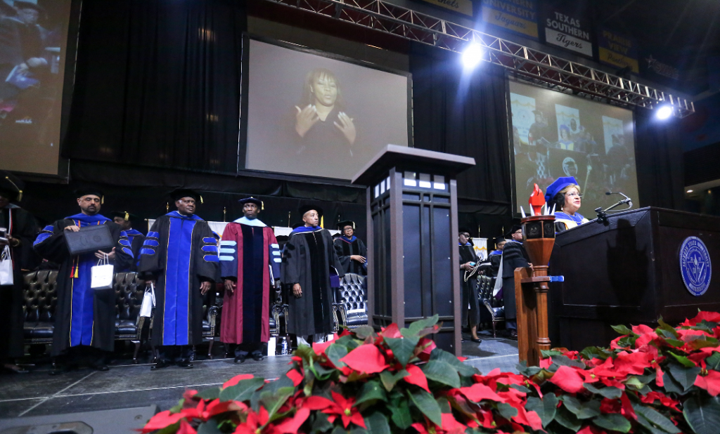 JSU’s distinguished guests and administrators listen as President Carolyn W. Meyers officiates the Fall 2015 Commencement ceremony that bestowed more than 750 undergraduate degrees. (Photo by Charles A. Smith/JSU)