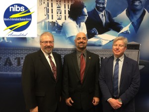 Members of the Network of International Business School panel of examiners meet with JSU College of Business dean, Dr. Ramin Maymasi (center) during a recent site visit.