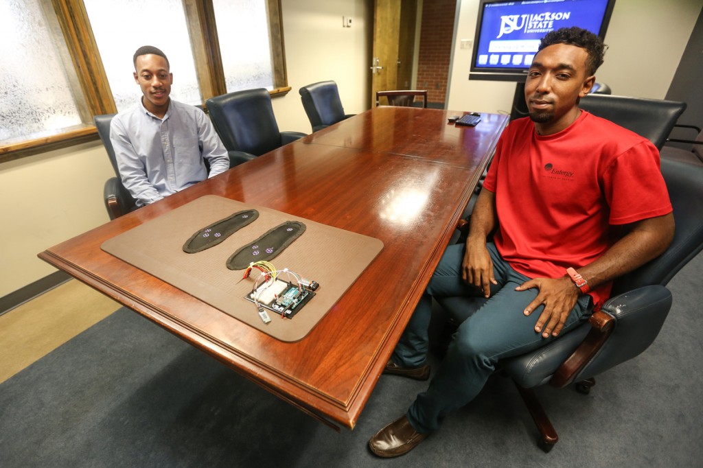 Smart Mat3: Chevan Baker, left, a senior computer engineering major from Kansas City, Mo., and Jann Butler, a senior computer engineering major from Pascagoula, Miss., were among four who helped develop a product called the smart mat to determine the foot temperature of diabetics. (Photo by Charles A. Smith/JSU)