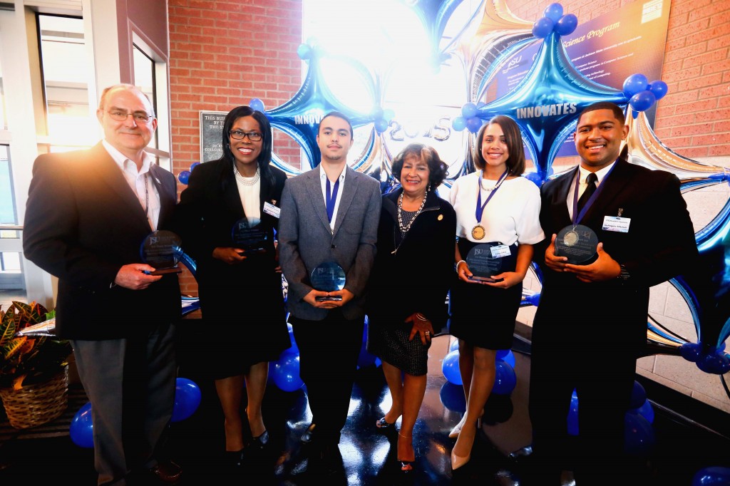JSU President Carolyn W. Meyers joins faculty in congratulating winners of JSU Social Entrepreneurship Business Plan Challenge. Along with Meyers include Dr. Kenneth Randall Russ, JSU’s College of Business; Dr. Marinelle Payton, School of Public Health; Omar Khattab, an entrepreneurship student; Kenya Gilkey, a public health student; and DeAngelo Mitchell, a business student. Missing is Kaylin Kinchion, a public health student. (Photo by Deontae Williams)