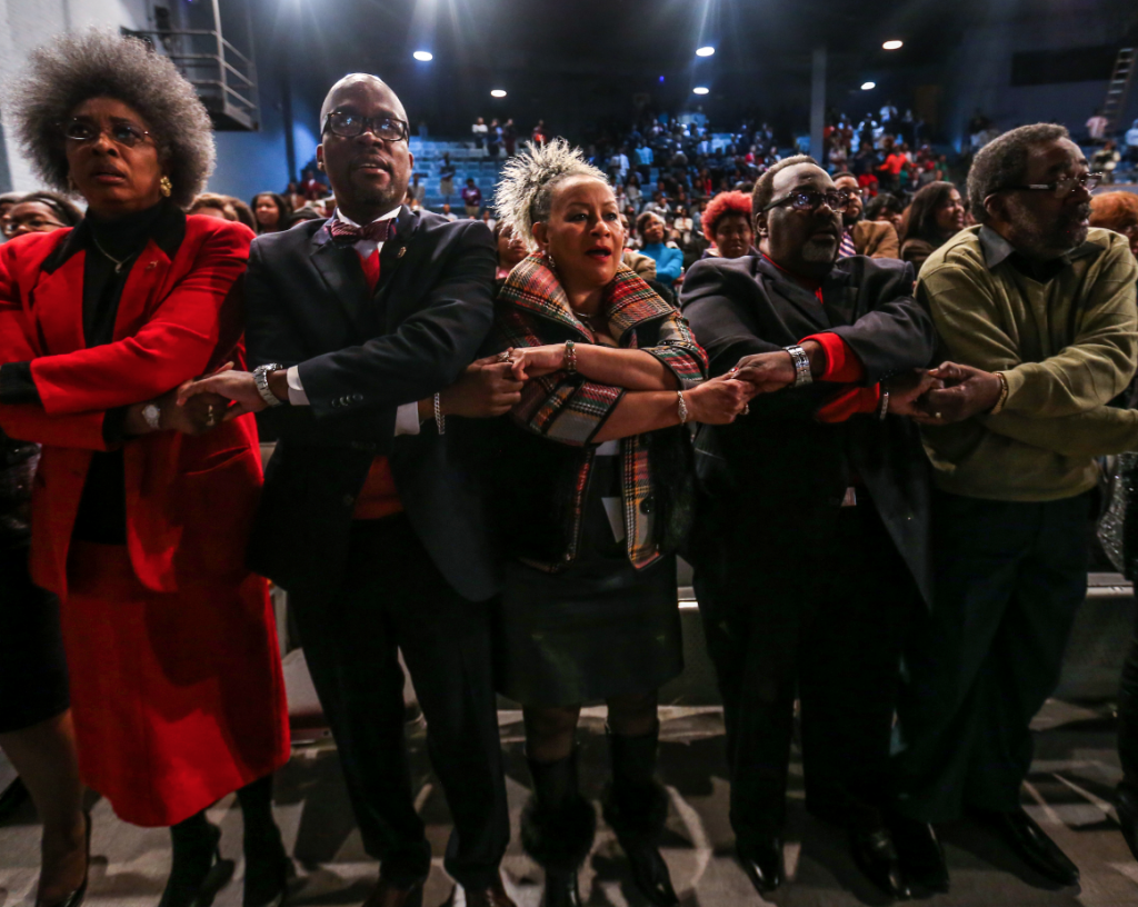 Singing “We Shall Overcome, “ the crowd at the Rose E. McCoy Auditorium on the main campus of JSU celebrates King’s legacy. (Photo by Deontae Williams/JSU)