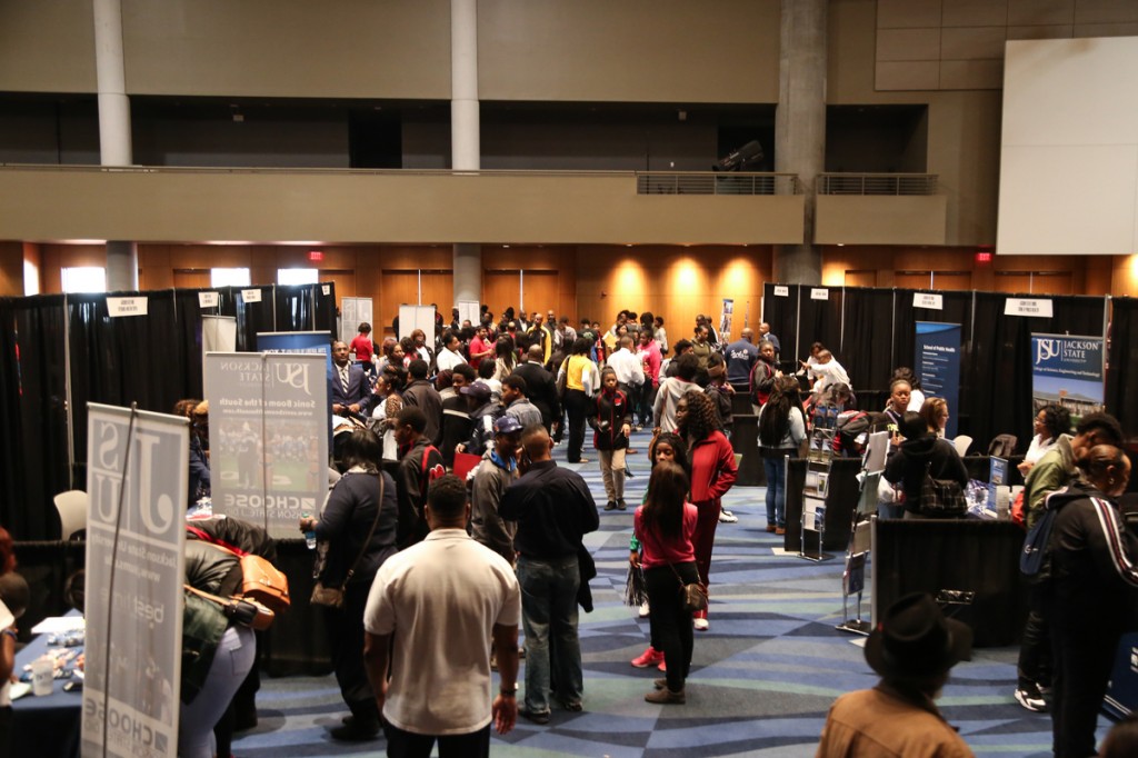 Throughout the day, hundreds of spectators milled about “1400 Lynch Aisle” inside the Georgia World Congress Center, where a sea of blue and white banners inundated the arena. Spectators peppered recruiters representing 16 divisions from JSU with questions about the country’s fourth-largest HBCU. (Photo by Kentrice S. Rush/JSU)