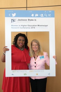 With help from JSU’s social media team, Tonyalle V. Rush and Julie Correro – both of Northwest Mississippi Community College – get “framed” during the conference attended by women throughout the state. (Photo by Frank Wilson/JSU)