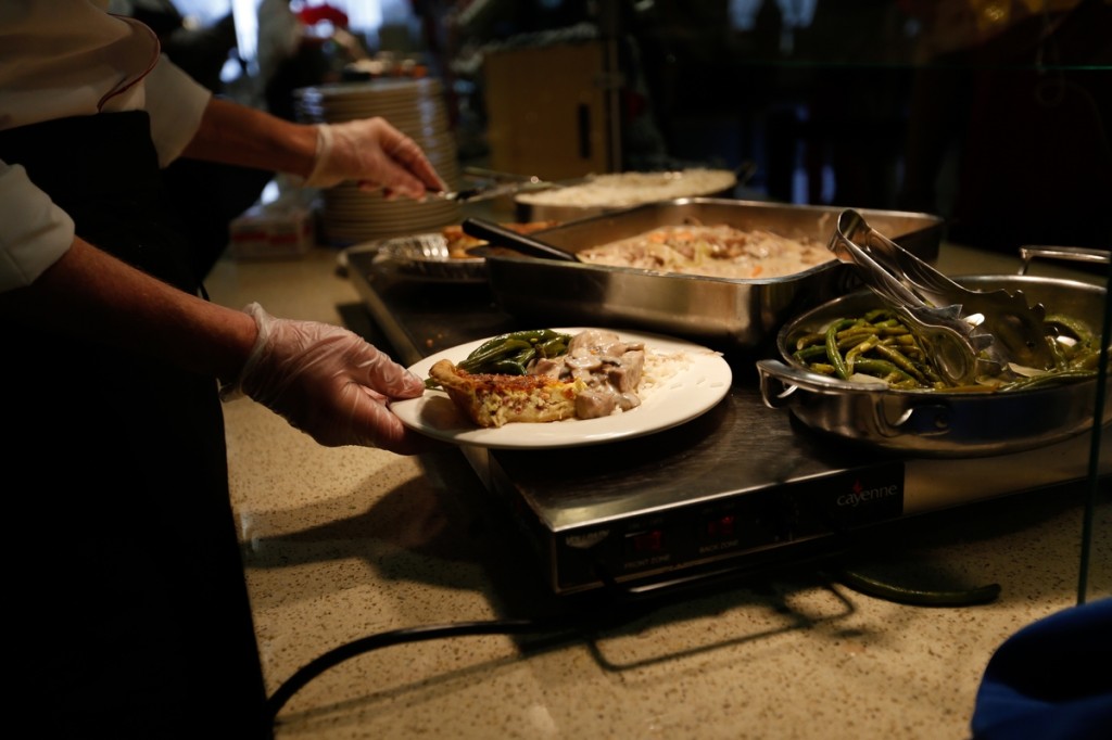 Aside from desserts, Vandomme’s included hot foods with quiche and vegetables. (Photo by Charles A. Smith/JSU)