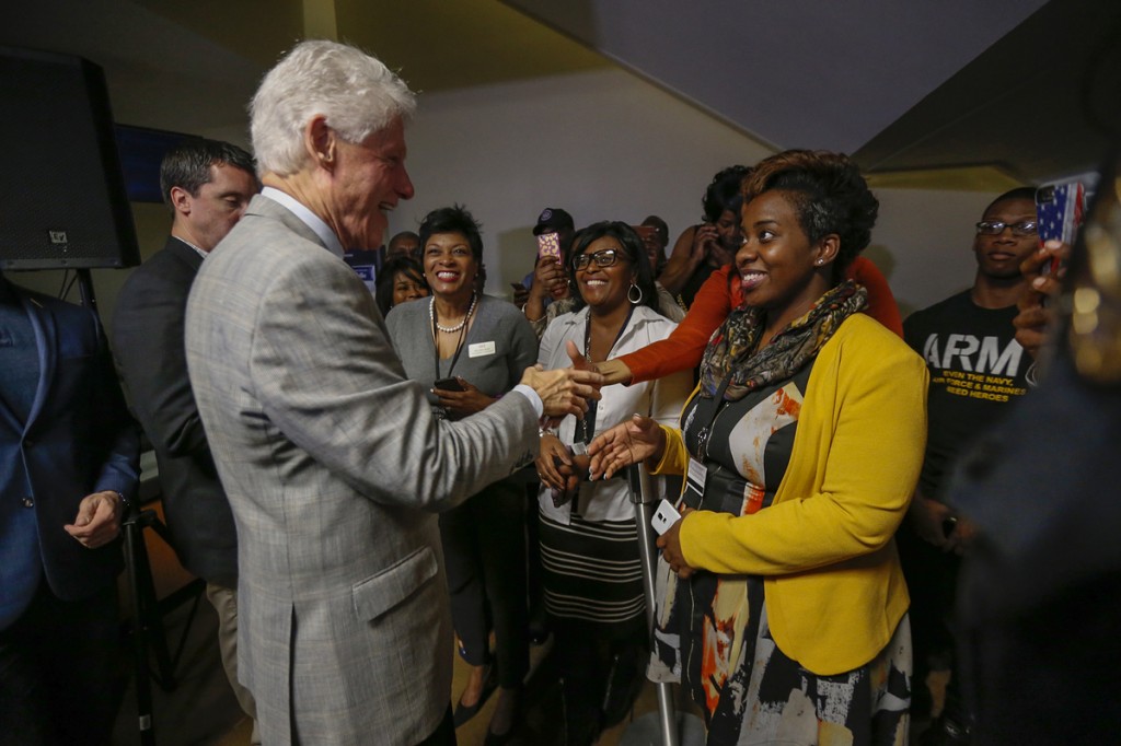 Clinton acknowledges JSU staffers, including marketing director Ashton Hall, right. (Photo by Charles A. Smith/JSU)