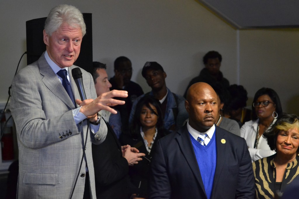 As JSU President Carolyn W. Meyers looks on, Clinton discusses crumbling infrastructure, U.S. Supreme Court nominations, rising college debt and the controversy about water tainted by lead. (Photo by William H. Kelly III/Courtesy of the Blue & White Flash)