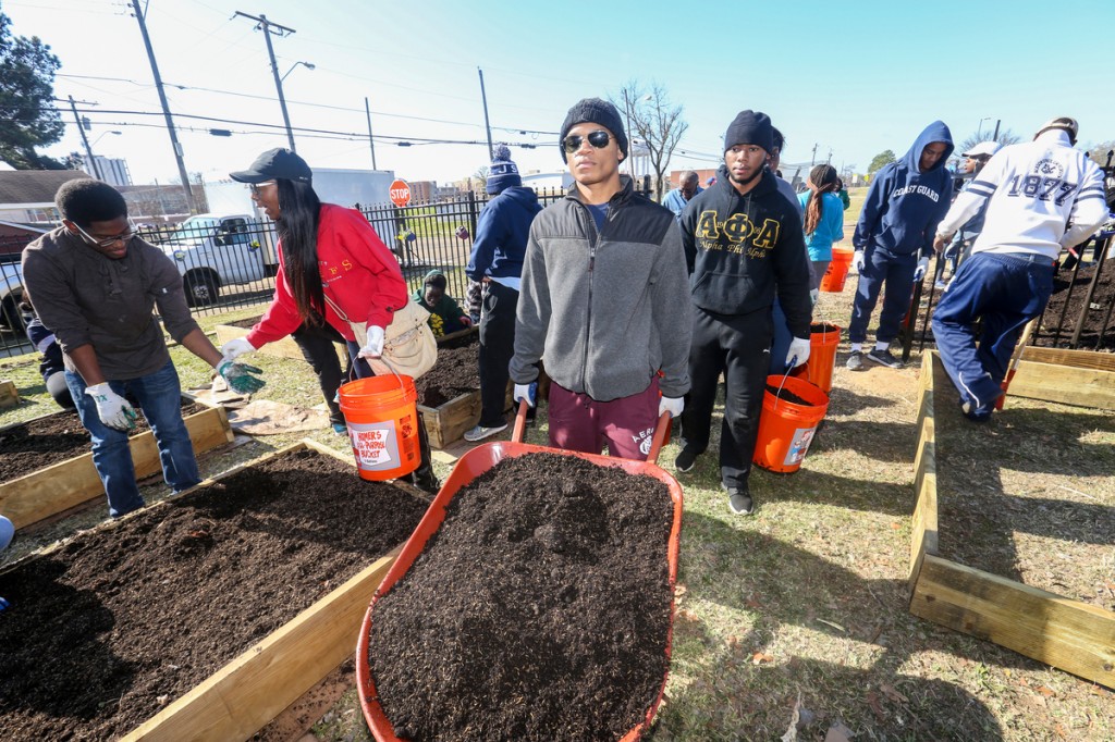 JSU students assist Blackburn Middle School with its garden project.