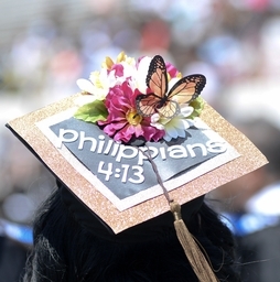 One graduate isn’t bashful about sharing the source of her journey. Photo by Darek Ashley/JSU)