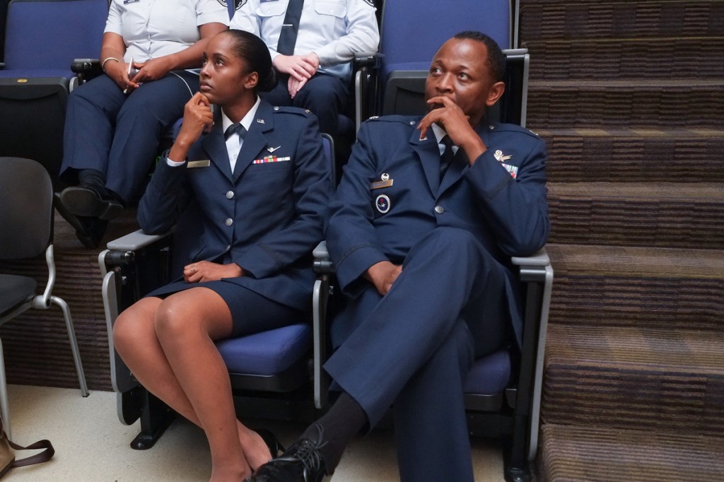 Lynn and Lt. Col. Timothy Henderson watch a video compilation of Lynn’s experience sat JSU and words of congratulations from her peers and supporters. (Photo by Charles A. Smith/JSU)