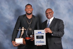JSU Tigers Head Football Coach Tony Hughes shares an award-winning moment with Javancy Jones, NCAA Statistical Champion FCS Football for the 2015 season.