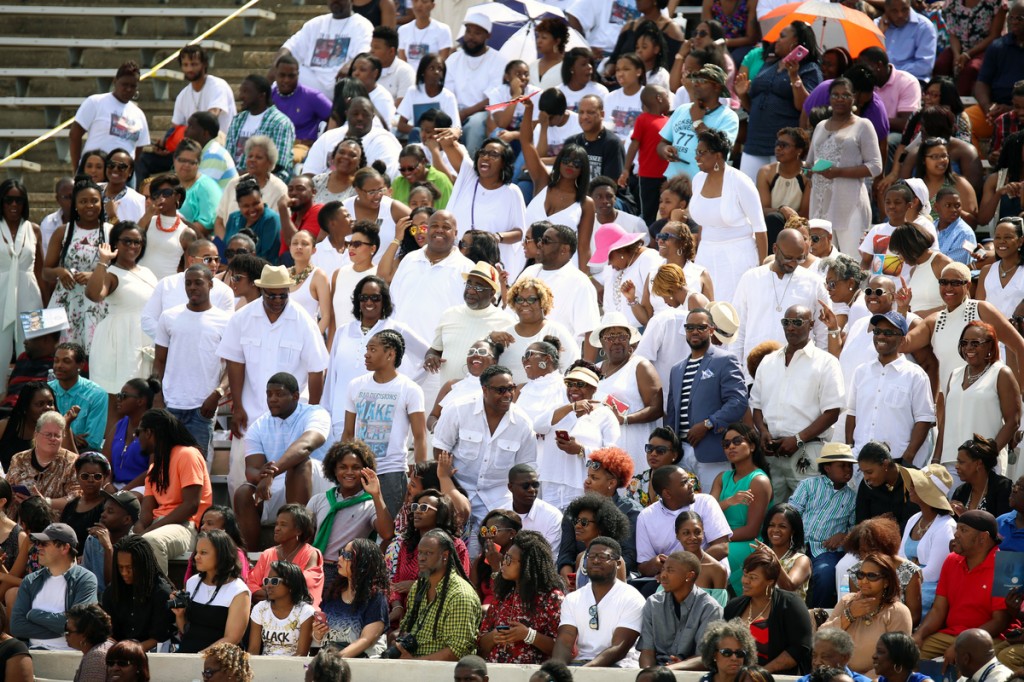 One family in the stands shows its solidarity and support of their honored graduate. (Photo by Deontae Williams)