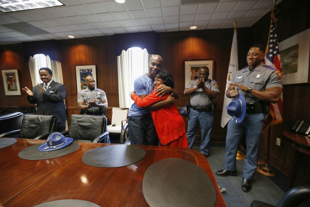 JSU President Carolyn W. Meyers shows her support to Mississippi Highway Patrol trooper DeAndre Dixon, a staunch JSU supporter, who was injured in a gunbattle in February. (Photo by Charles A. Smith)