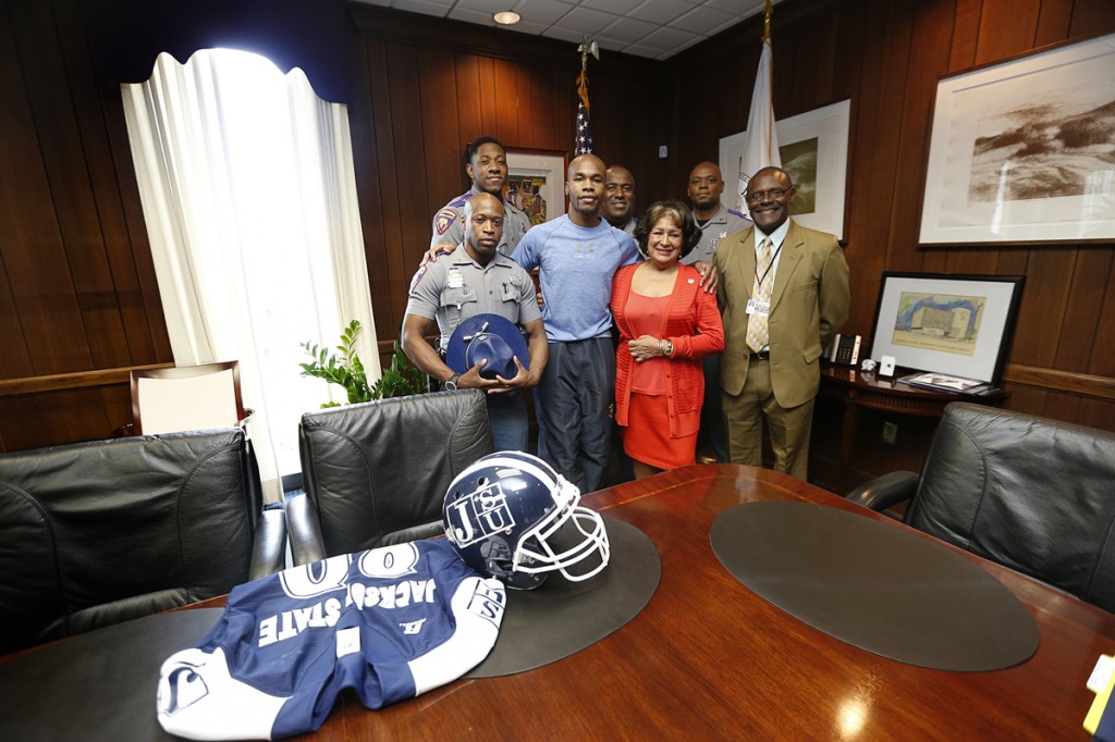 Meyers, with JSU head football Coach Tony Hughes, appears with Trooper Dixon and his comrades. (Photo by Charles A. Smith)
