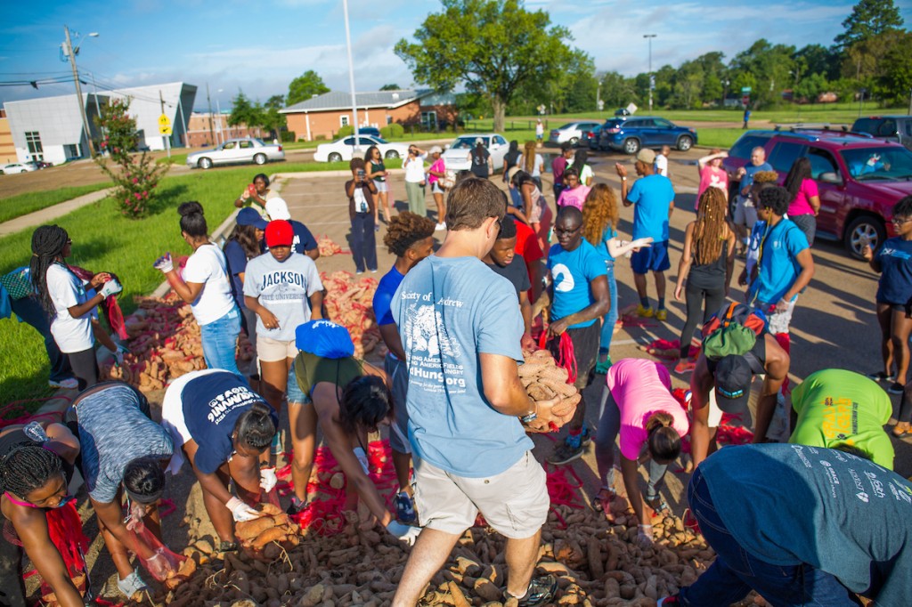 Dozens work up a sweat to provide a sweet offering to the community. (Photo by Charles A. Smith/JSU)