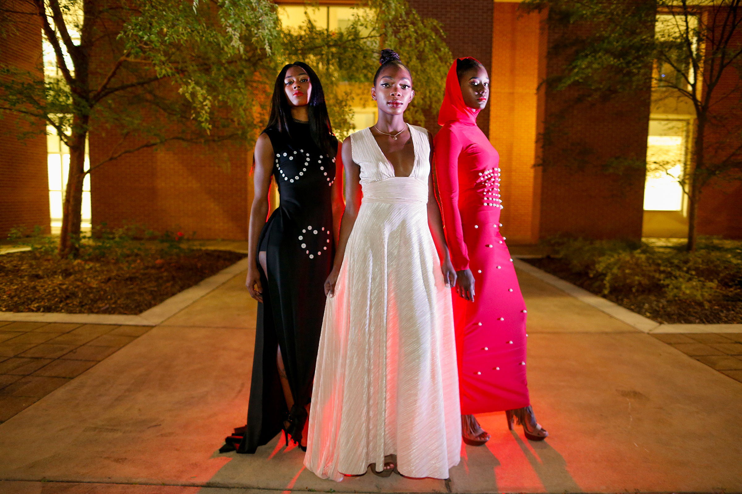 Student models from JSU and Tougaloo pose in Kelly type styles designed by Kamie's Kreations. (Photo by Charles A. Smith/JSU)